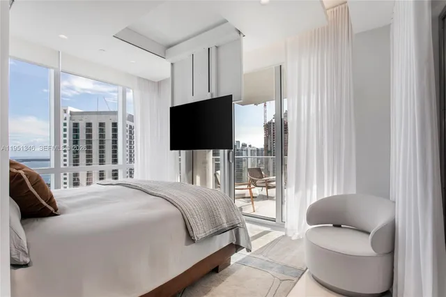 a bathroom with a bathtub and a sink