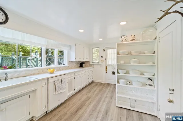 a bed room with furniture and a window