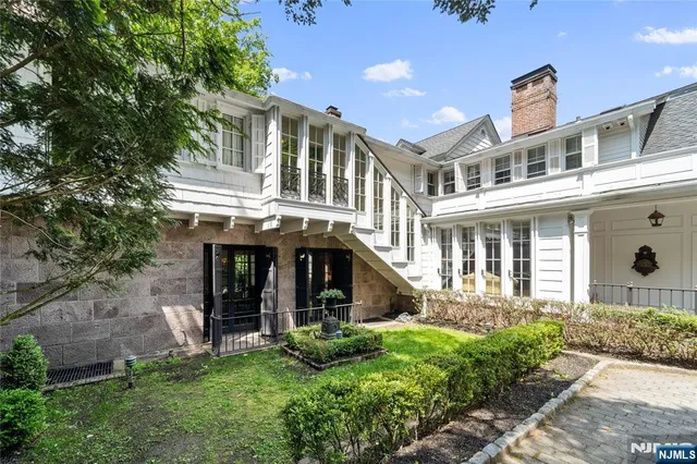 a view of a building with a garden