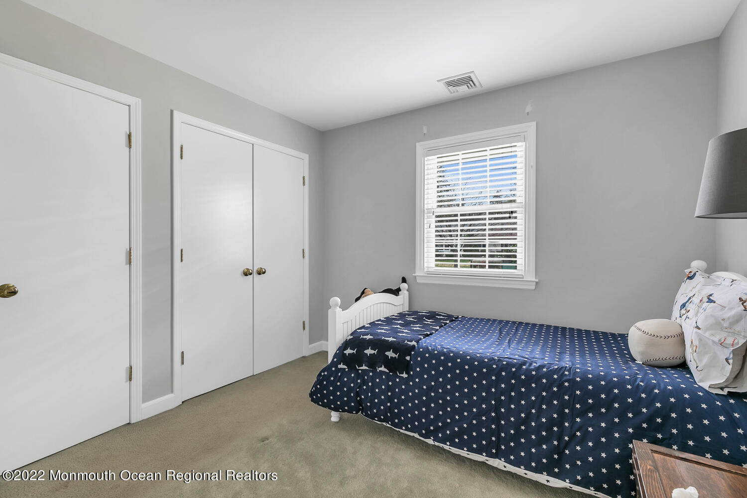 224 Garden Road Shrewsbury, NJ 07702 - Photo 17 of 33 a bedroom with a bed and a window