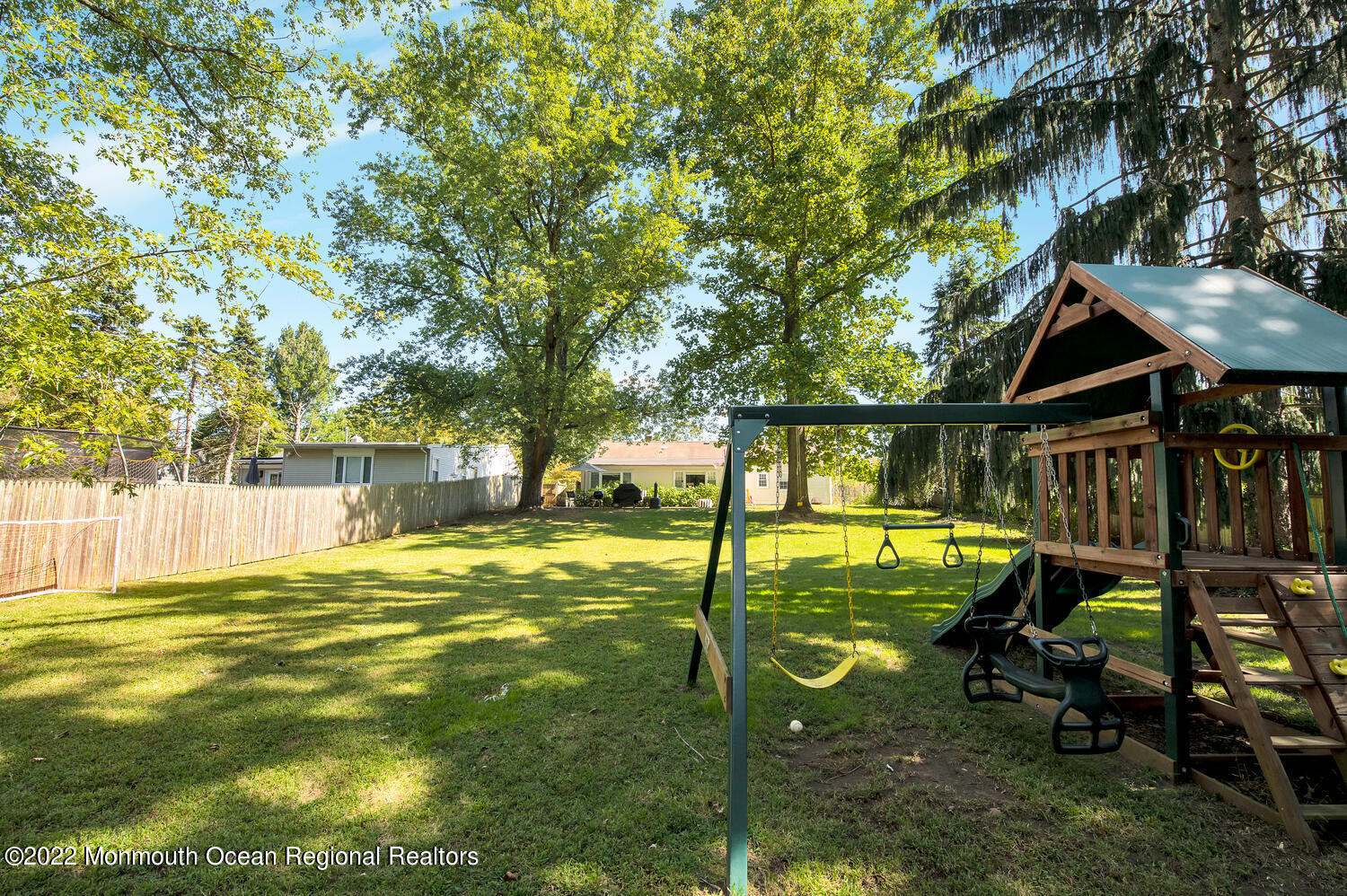 224 Garden Road Shrewsbury, NJ 07702 - Photo 30 of 33 a view of a swimming pool with a patio and a yard