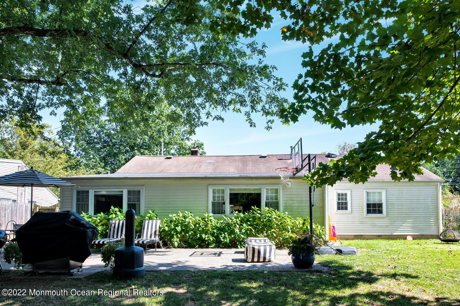 224 Garden Road Shrewsbury, NJ 07702 - Photo 33 of 33 a front view of a house with a yard and potted plants