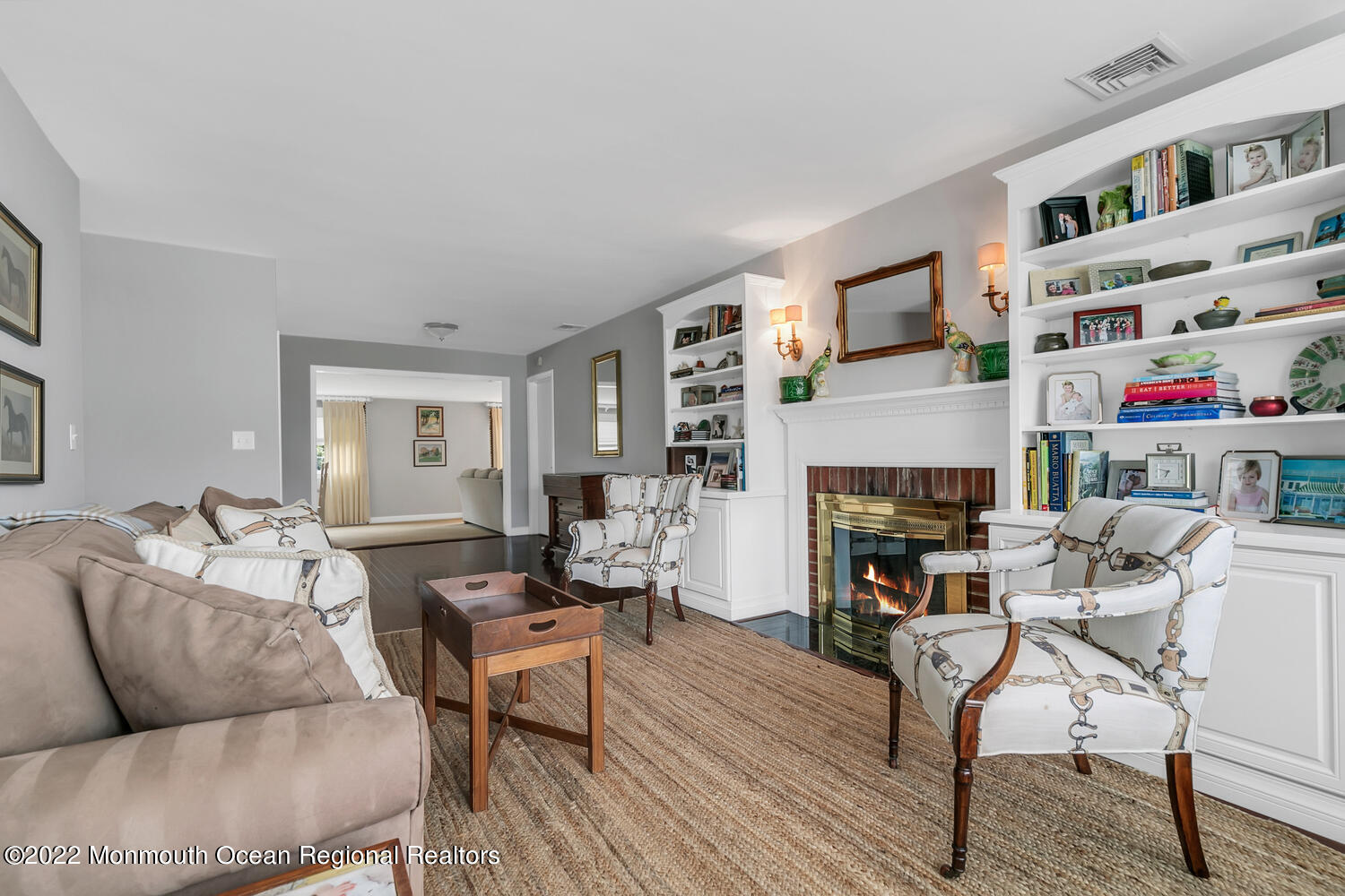 224 Garden Road Shrewsbury, NJ 07702 - Photo 8 of 33 a living room with furniture and a fireplace