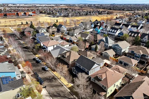 an aerial view of a house with a garden