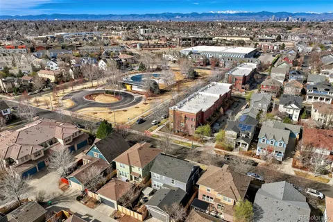 an aerial view of residential building and ocean