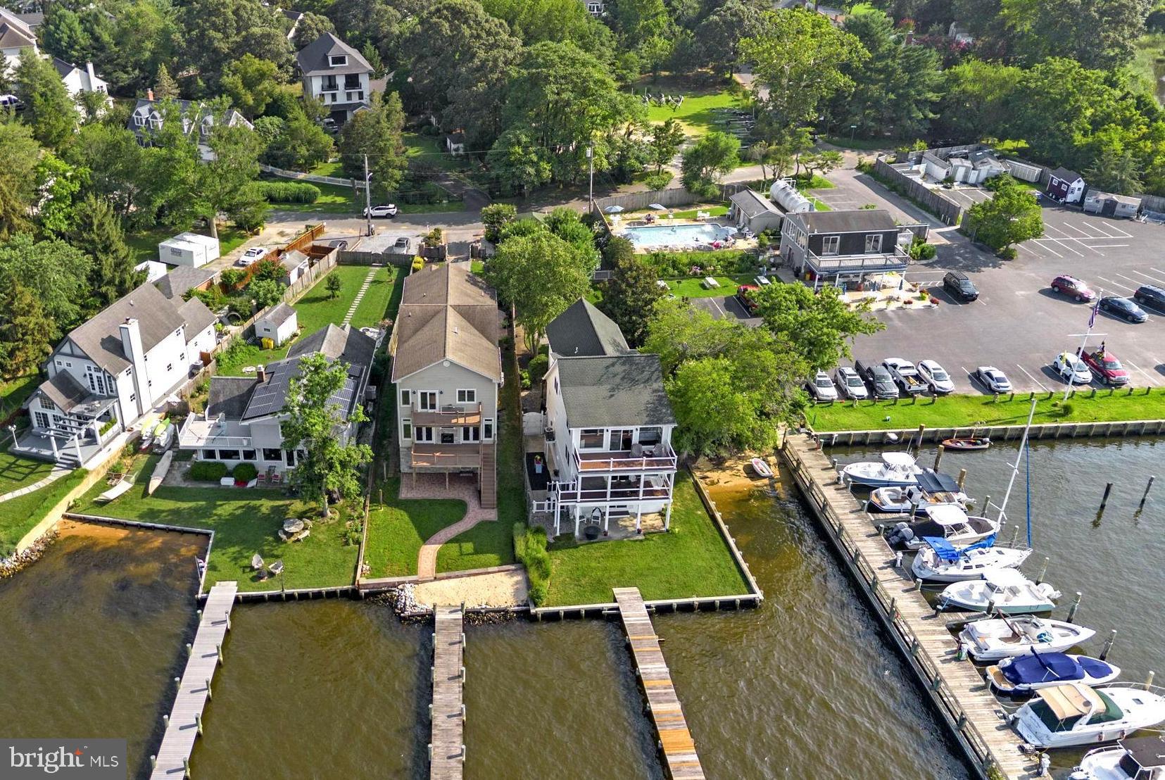 an aerial view of a house with a ocean view