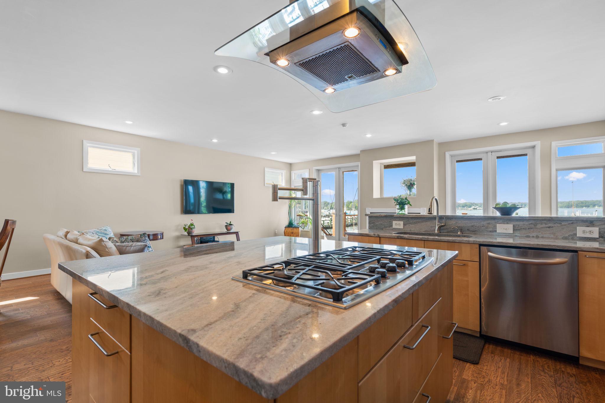 370 Magothy Road Severna Park, MD 21146 - Photo 13 of 64 a kitchen with a stove and a wooden floor