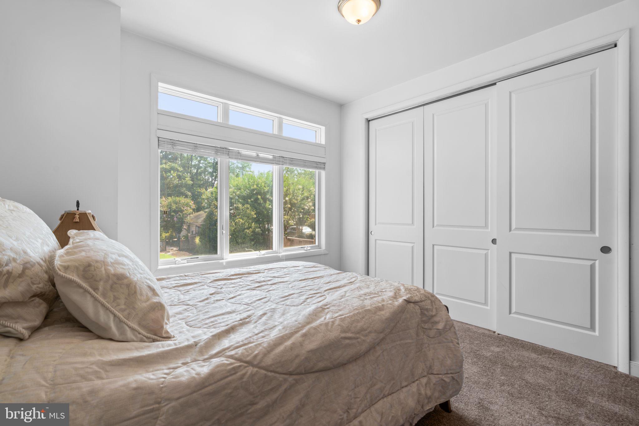 370 Magothy Road Severna Park, MD 21146 - Photo 18 of 64 a bedroom with a bed and a window