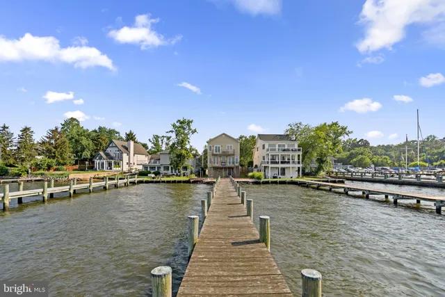 a view of residential houses with outdoor space
