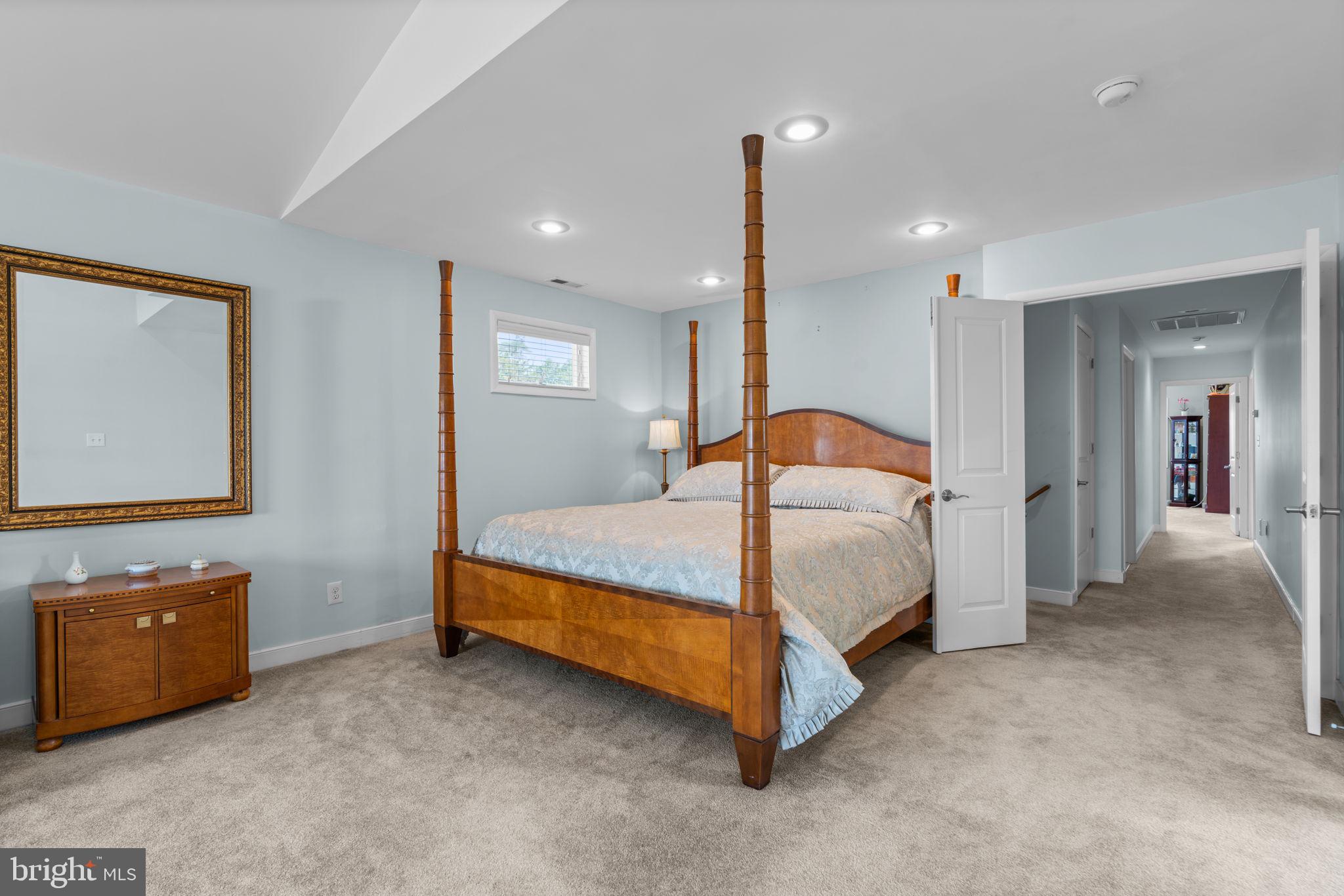 370 Magothy Road Severna Park, MD 21146 - Photo 22 of 64 a bedroom with a bed and a night stand