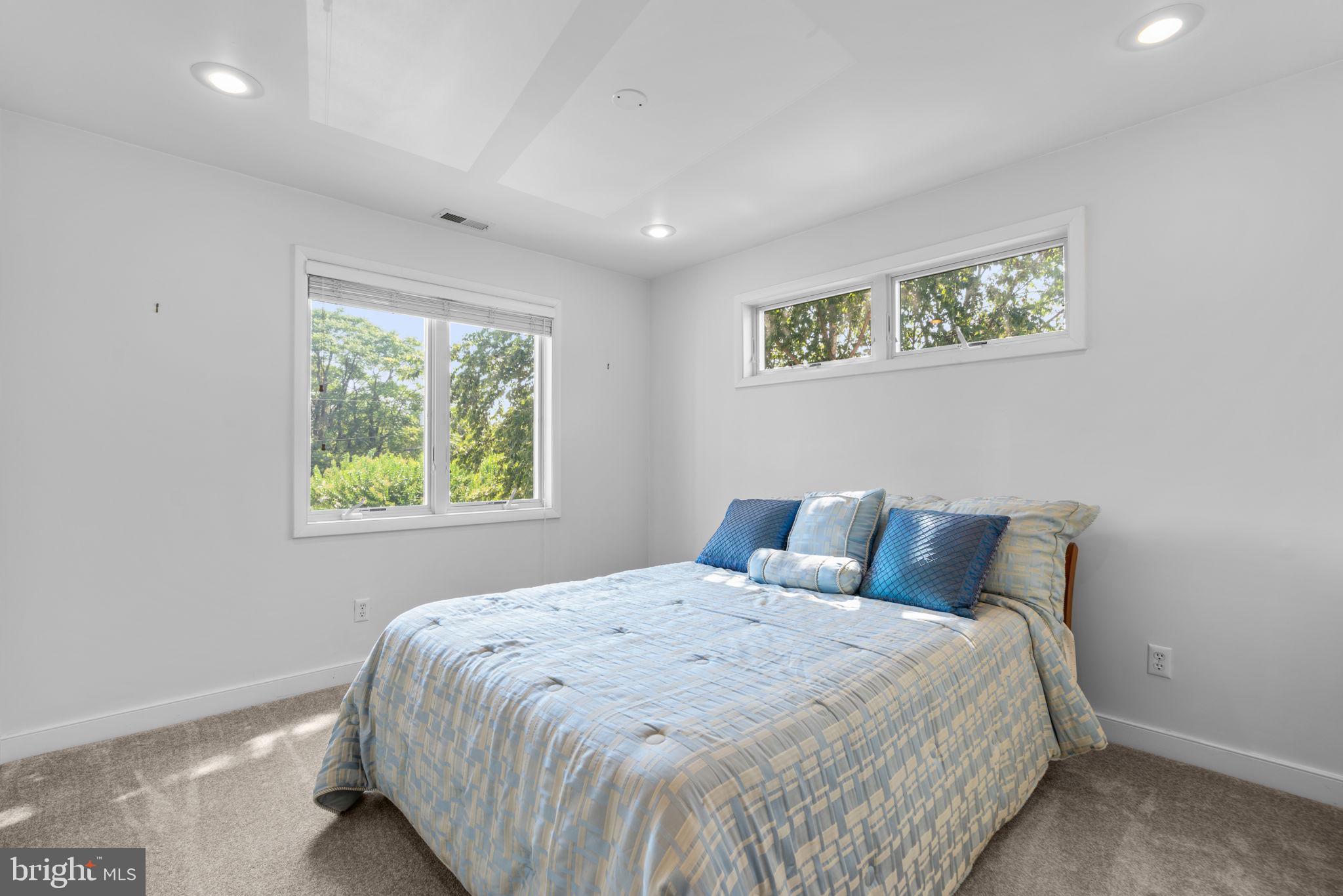 370 Magothy Road Severna Park, MD 21146 - Photo 30 of 64 a bedroom with a bed and a window