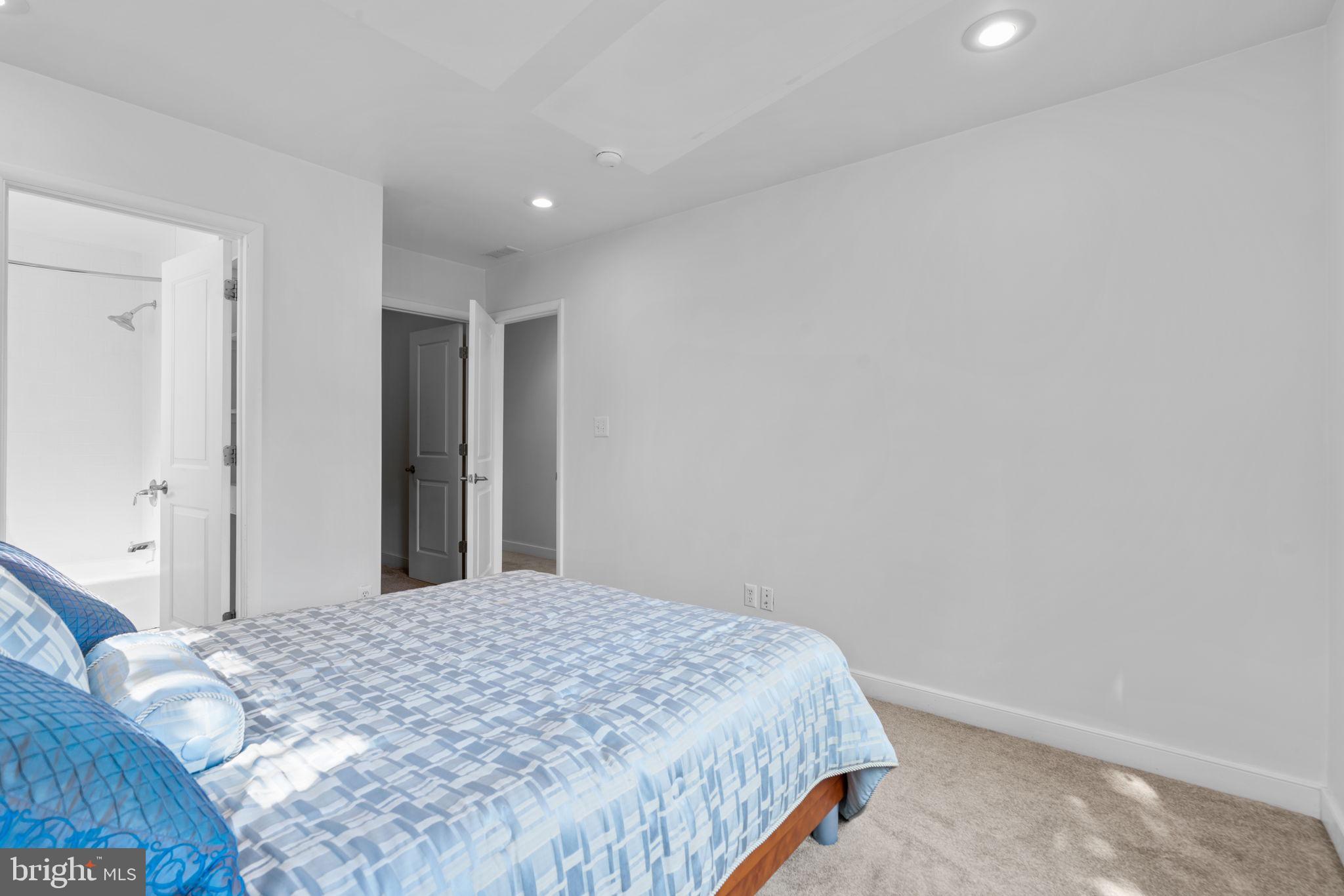 370 Magothy Road Severna Park, MD 21146 - Photo 31 of 64 a bedroom with a bed and a window