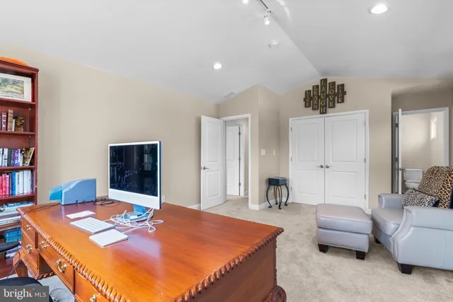 a view of a garden with lawn chairs