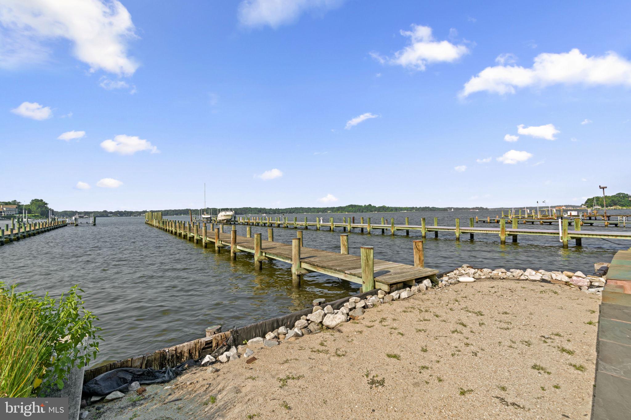 370 Magothy Road Severna Park, MD 21146 - Photo 4 of 64 a view of ocean with boats and trees in the background