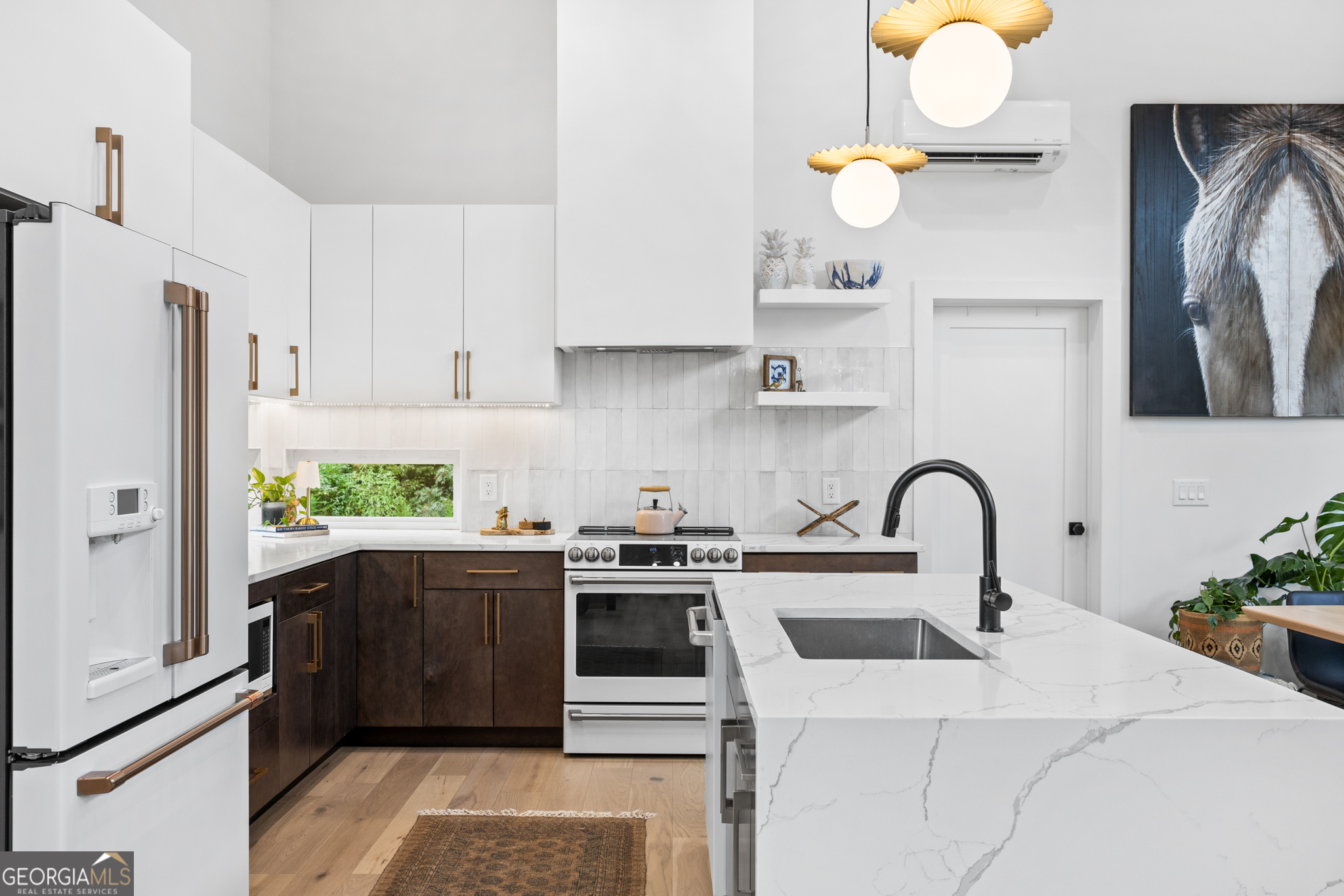 21 That Way Young Harris, GA 30582 - Photo 11 of 60 a kitchen with stainless steel appliances a stove a refrigerator a sink a counter space and cabinets