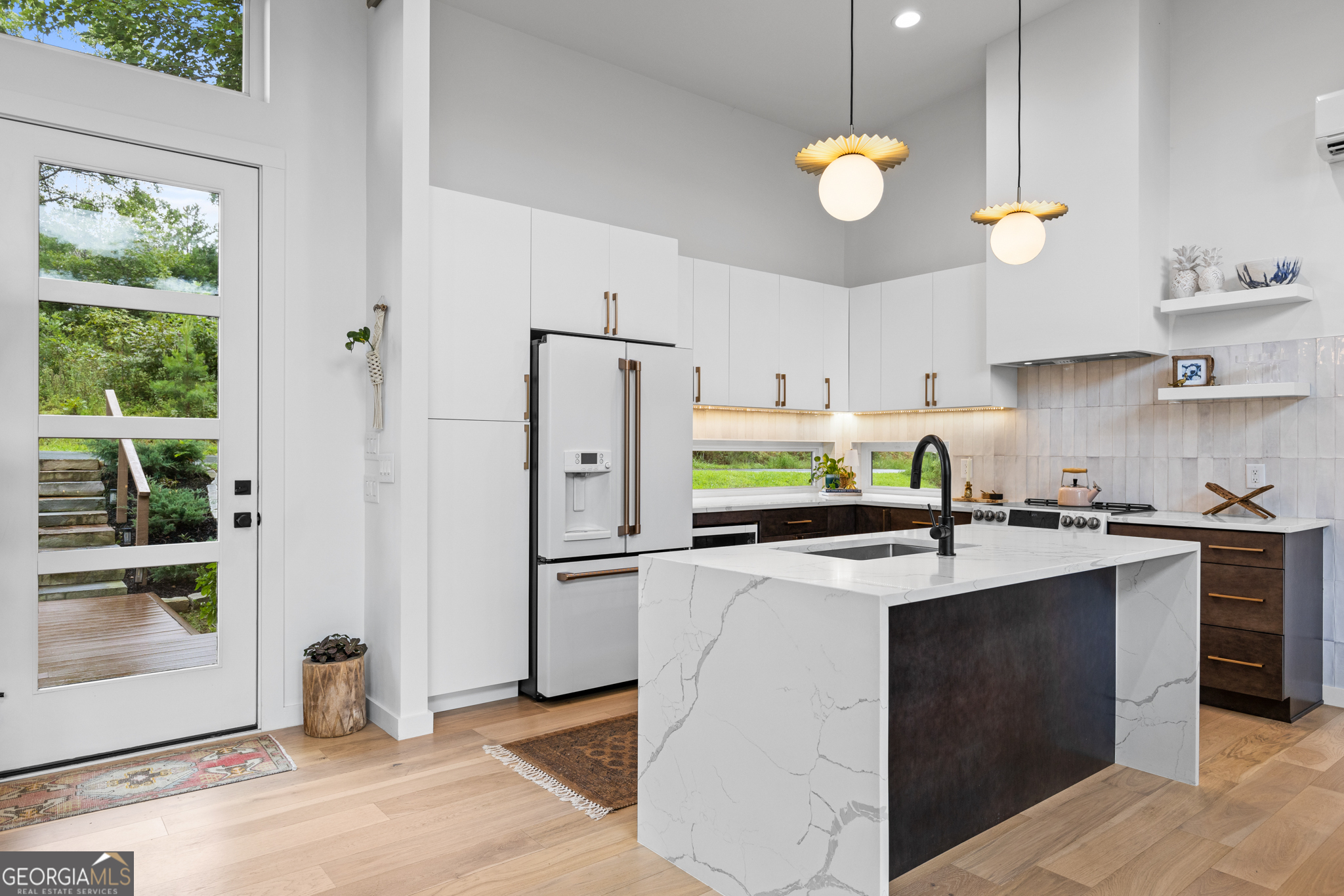 21 That Way Young Harris, GA 30582 - Photo 13 of 60 a kitchen with refrigerator and window