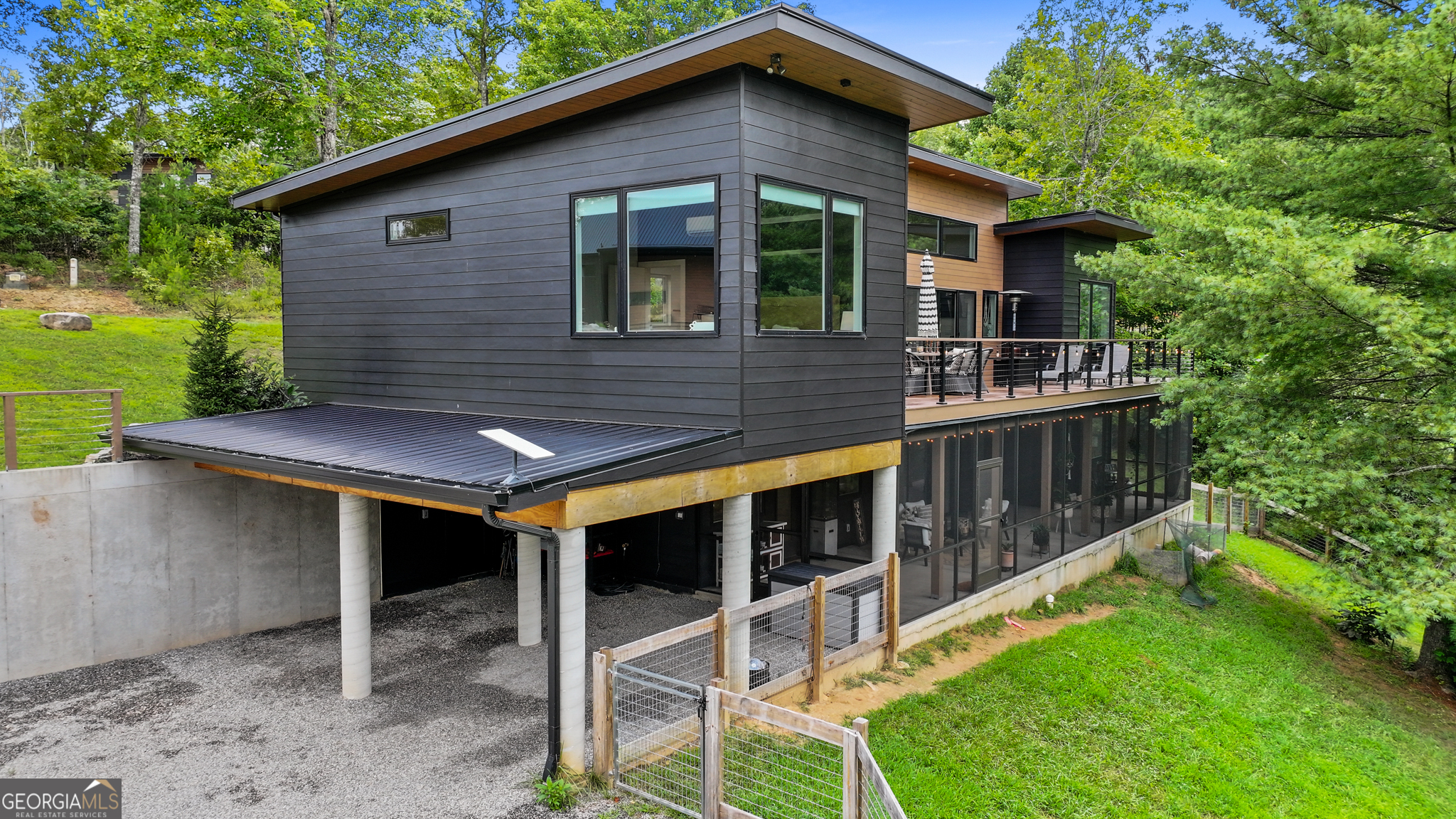21 That Way Young Harris, GA 30582 - Photo 2 of 60 a view of house with backyard space and balcony