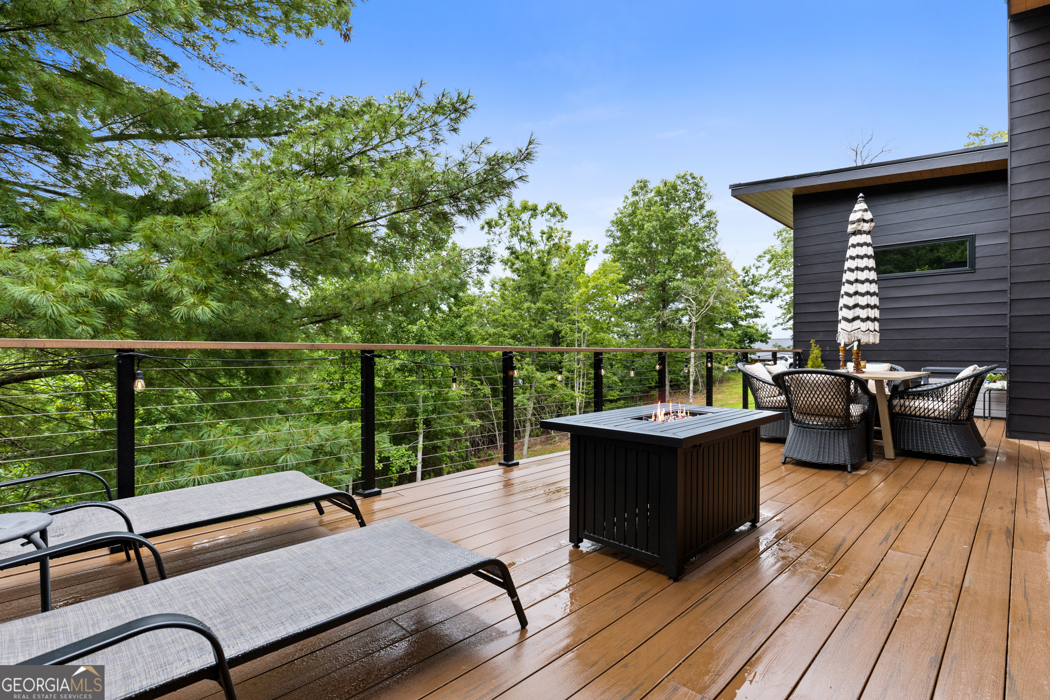 21 That Way Young Harris, GA 30582 - Photo 25 of 60 a view of a roof deck with couches