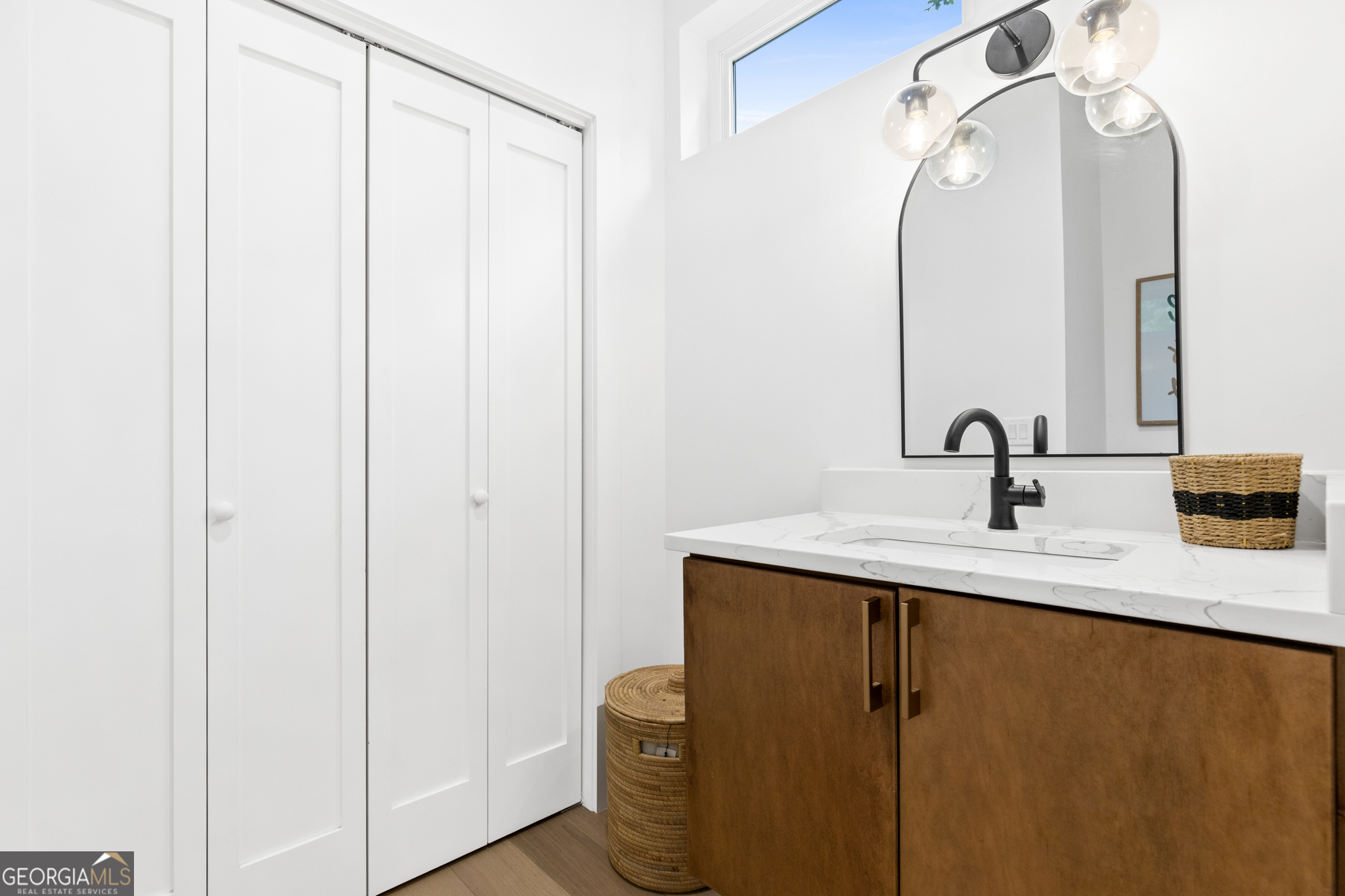 21 That Way Young Harris, GA 30582 - Photo 35 of 60 a bathroom with a sink and mirror