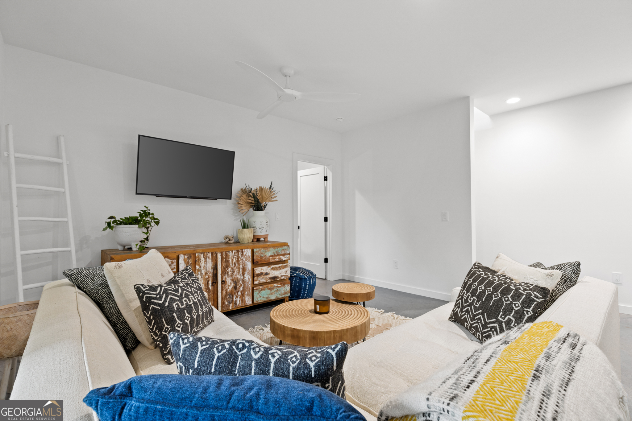 21 That Way Young Harris, GA 30582 - Photo 39 of 60 a living room with furniture and a flat screen tv