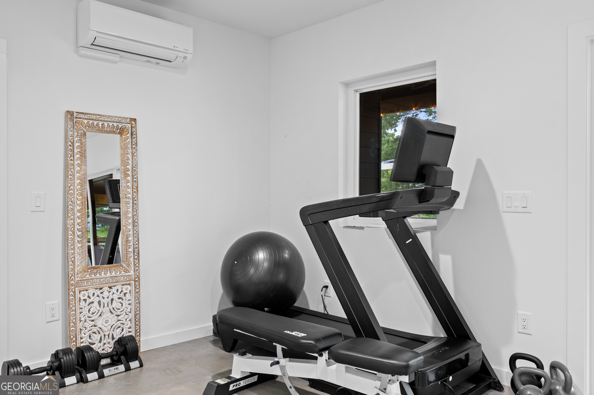 21 That Way Young Harris, GA 30582 - Photo 41 of 60 a room with furniture and gym equipment