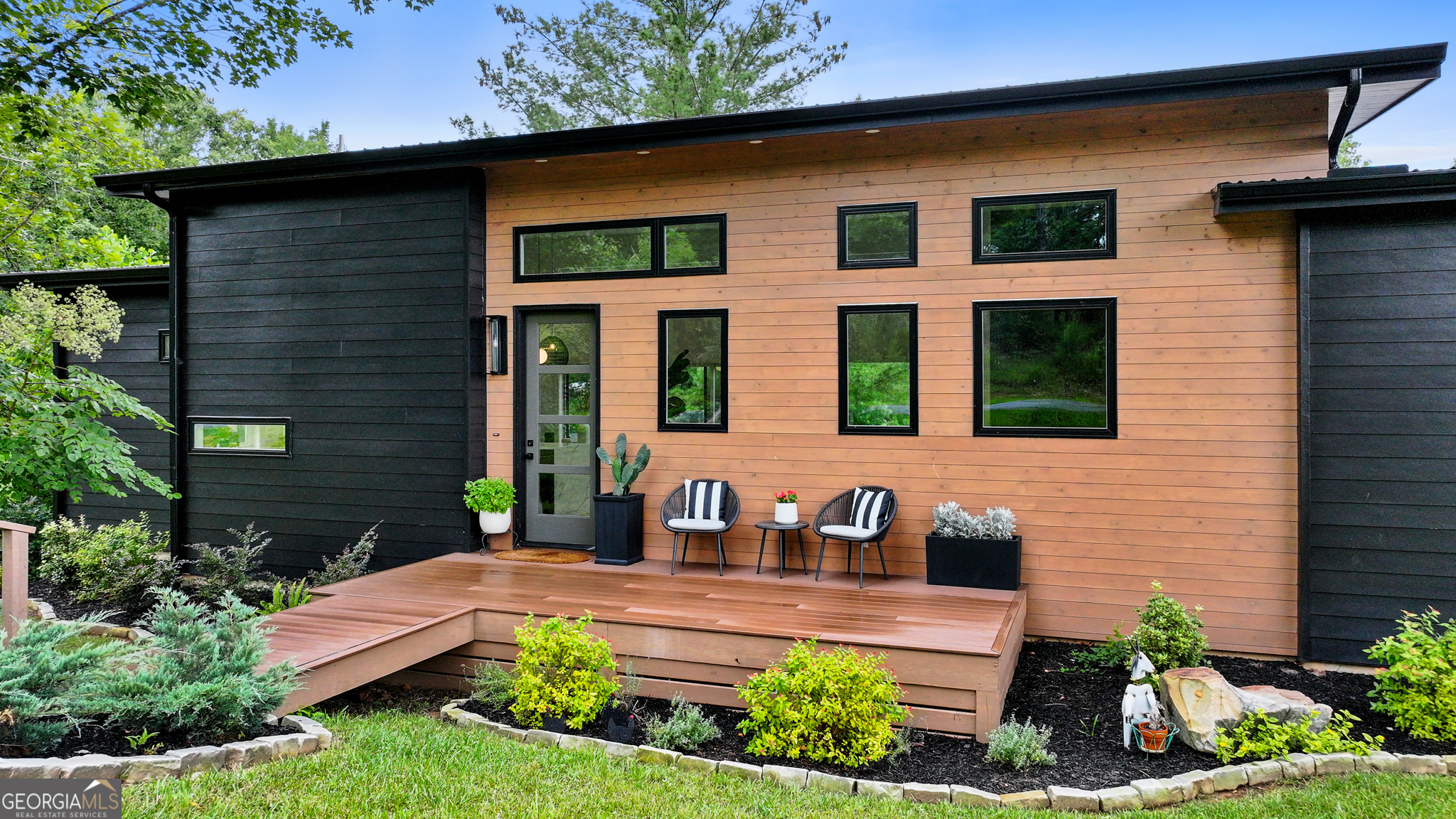 21 That Way Young Harris, GA 30582 - Photo 55 of 60 a front view of a house with garden