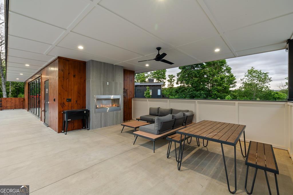 21 That Way Young Harris, GA 30582 - Photo 58 of 60 a outdoor living space with furniture and a potted plant