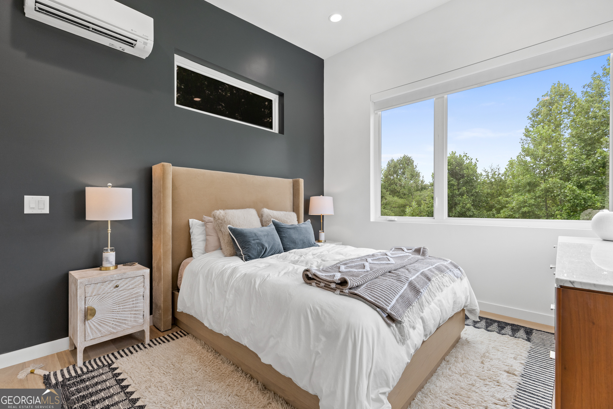 21 That Way Young Harris, GA 30582 - Photo 7 of 60 a bedroom with a bed and a night stand