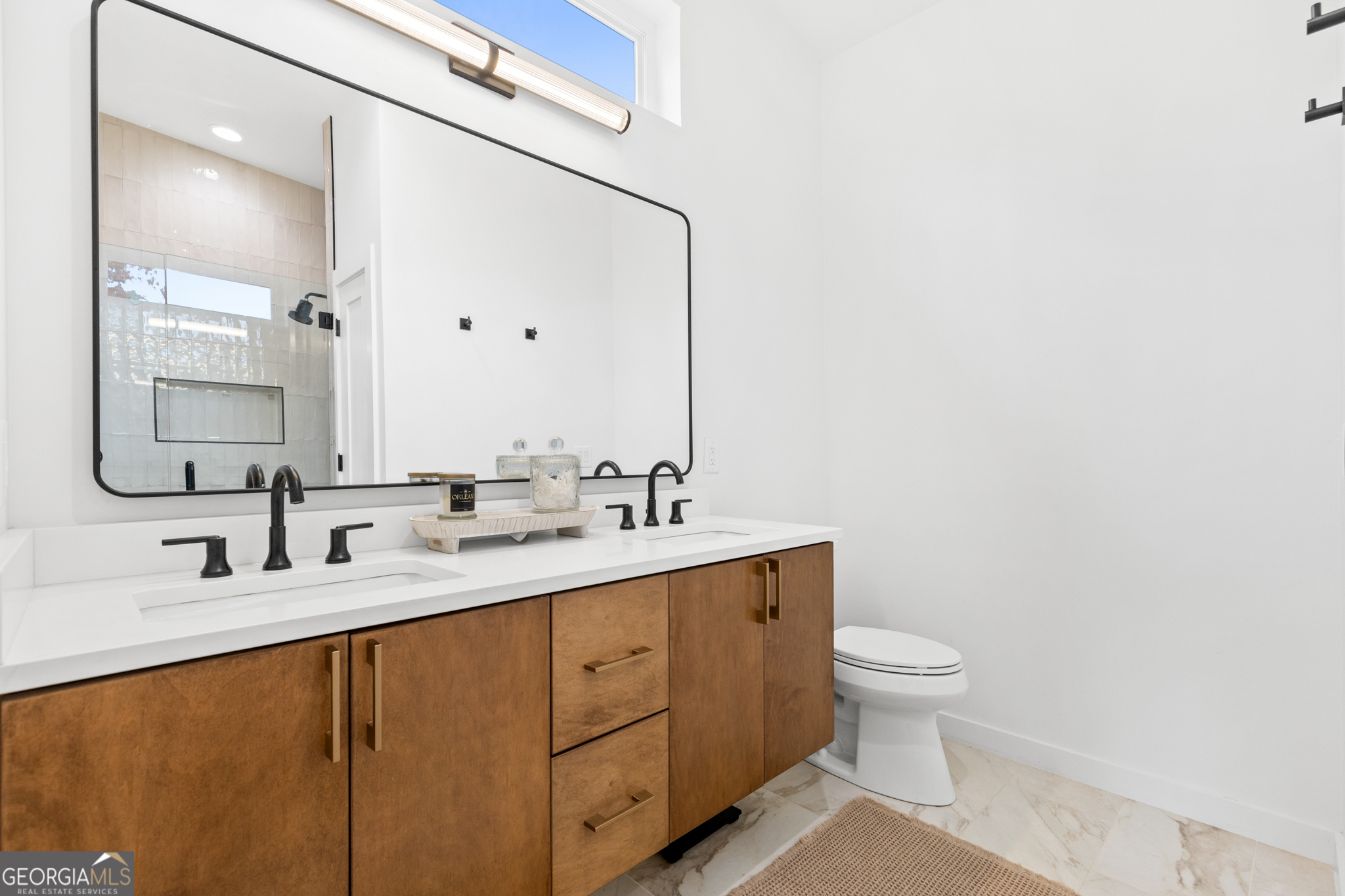 21 That Way Young Harris, GA 30582 - Photo 8 of 60 a bathroom with a toilet sink and mirror