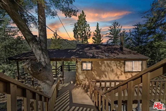 a view of balcony with a tree