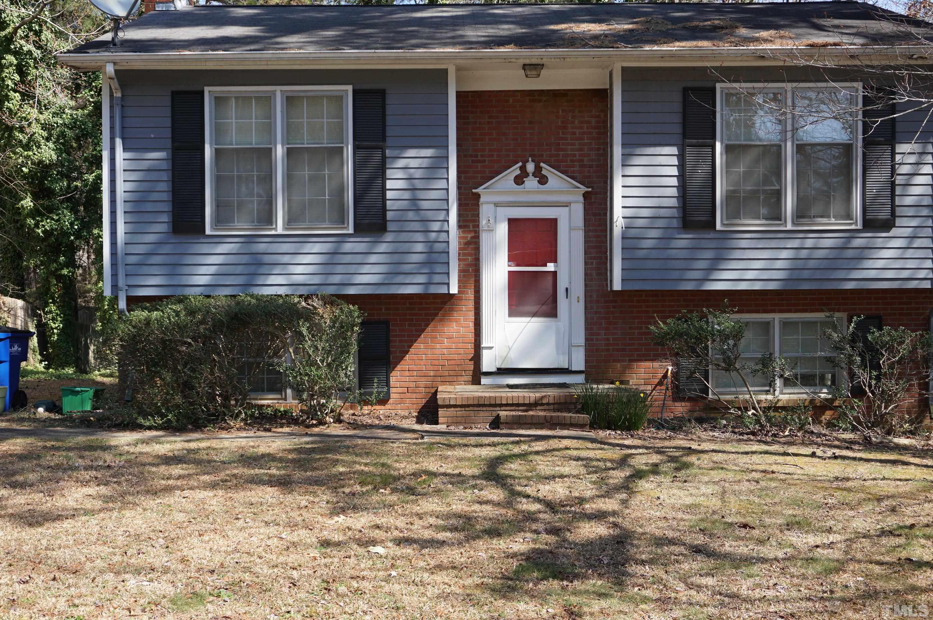 7804 Prospector Place Raleigh, NC 27615 - Photo 1 of 12 a front view of house with street