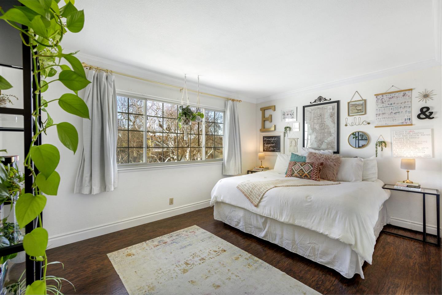 6479 Barron Place Gilroy, CA 95020 - Photo 14 of 26 a bedroom with a bed table and a window