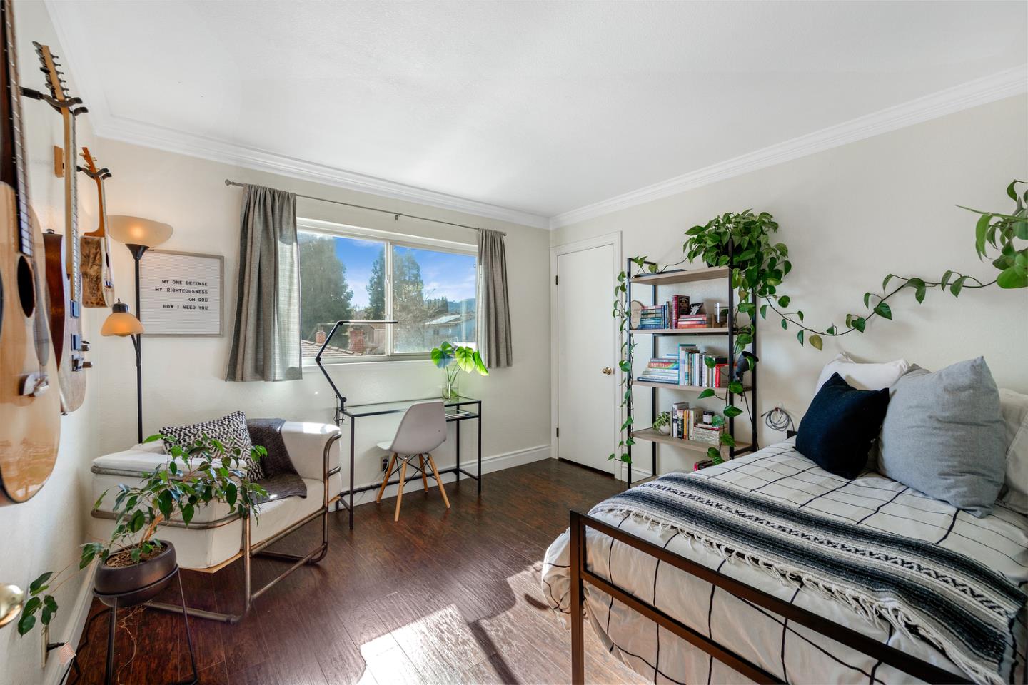 6479 Barron Place Gilroy, CA 95020 - Photo 17 of 26 a bedroom with furniture and a wooden floor