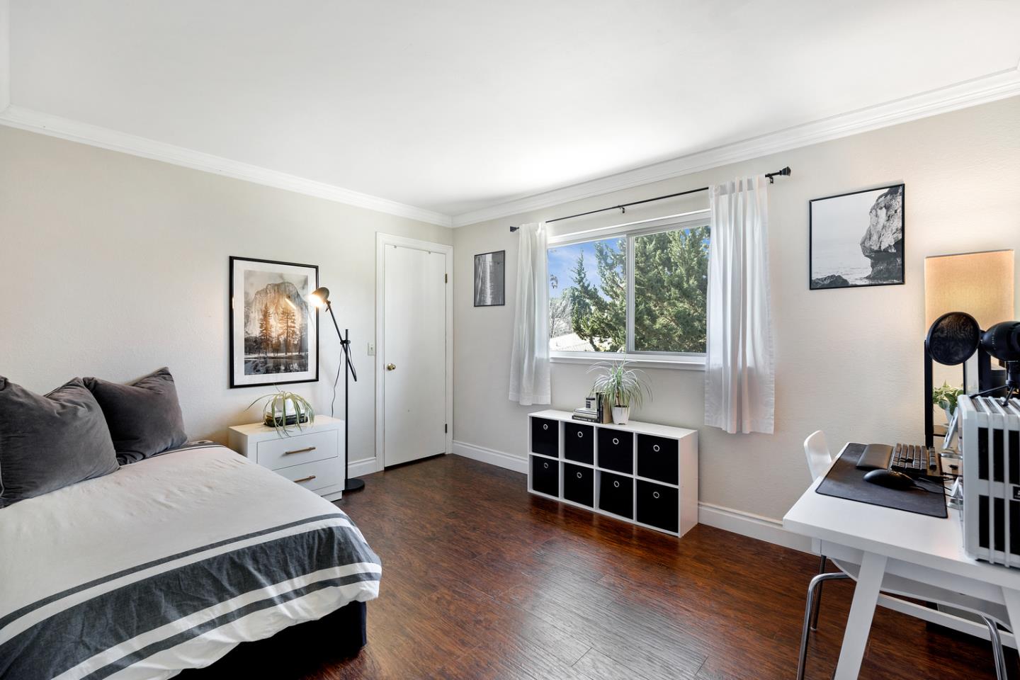 6479 Barron Place Gilroy, CA 95020 - Photo 18 of 26 a bedroom with a bed and a window