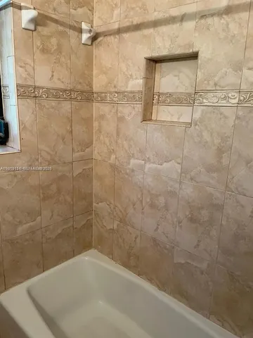 a bathroom with a bathtub