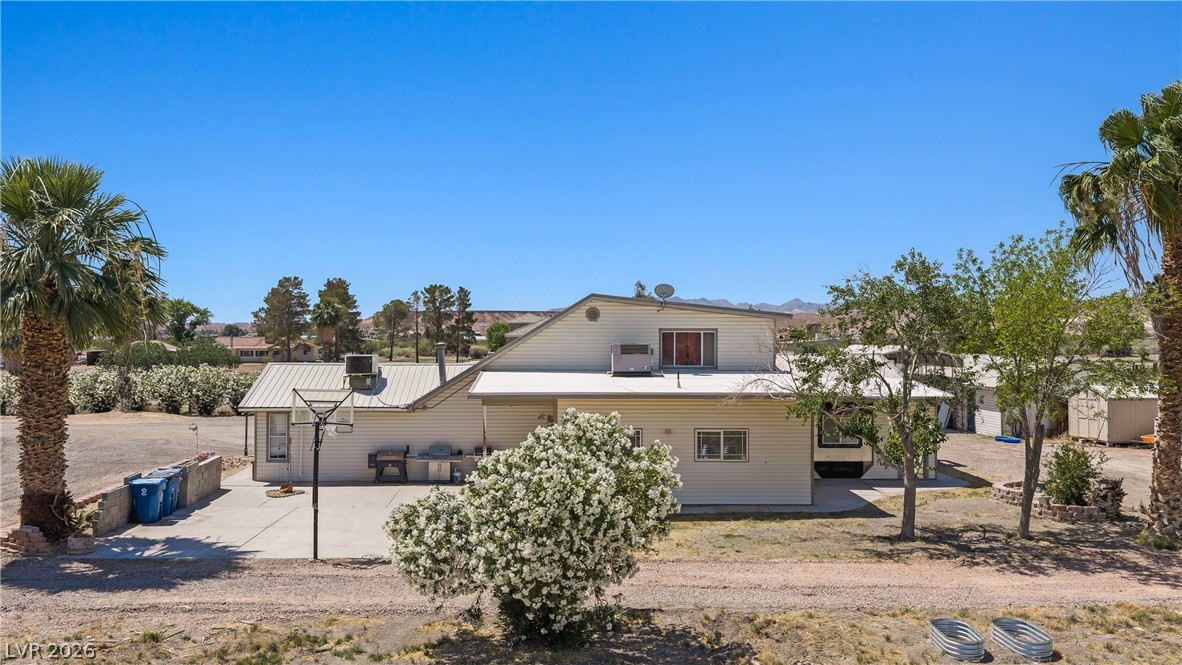 750 Leming Avenue Overton, NV 89040 - Photo 65 of 82 This residence features a patio for outdoor living and a durable metal roof.