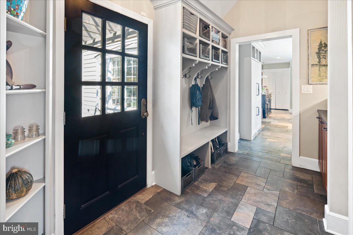 1781 Stuart Road West Princeton, NJ 08540 - Photo 21 of 57 Side door to mudroom with cubbies.