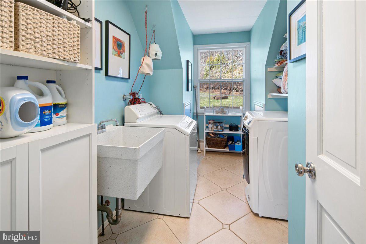 1781 Stuart Road West Princeton, NJ 08540 - Photo 35 of 57 Upstairs laundry room with sink & storage.