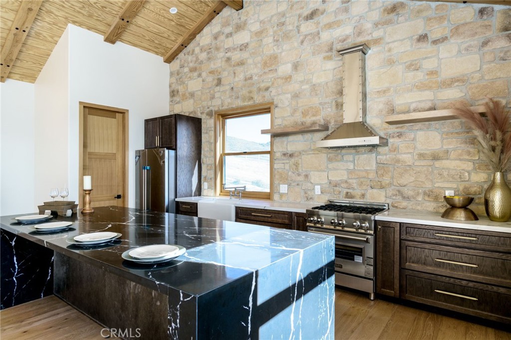 37219 Quarter Valley Road Temecula, CA 92592 - Photo 15 of 51 a kitchen with a stove and a sink