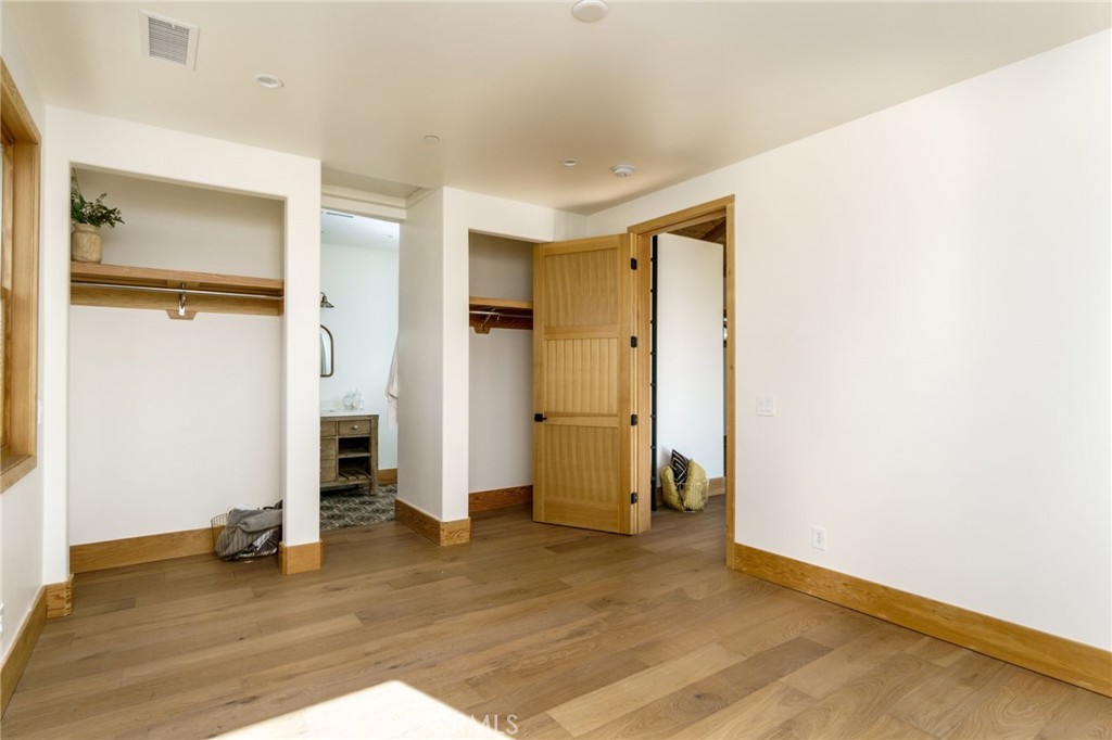 37219 Quarter Valley Road Temecula, CA 92592 - Photo 24 of 51 a view of empty room with wooden floor