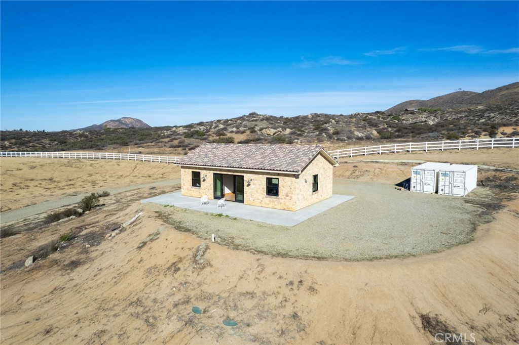 37219 Quarter Valley Road Temecula, CA 92592 - Photo 7 of 51 a view of a lake with a mountain in the background