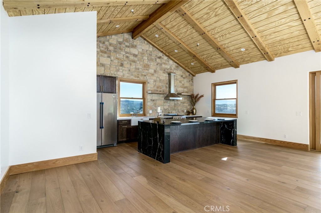 37219 Quarter Valley Road Temecula, CA 92592 - Photo 9 of 51 a view of kitchen with wooden floor