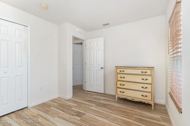 a view of room with walk in closet