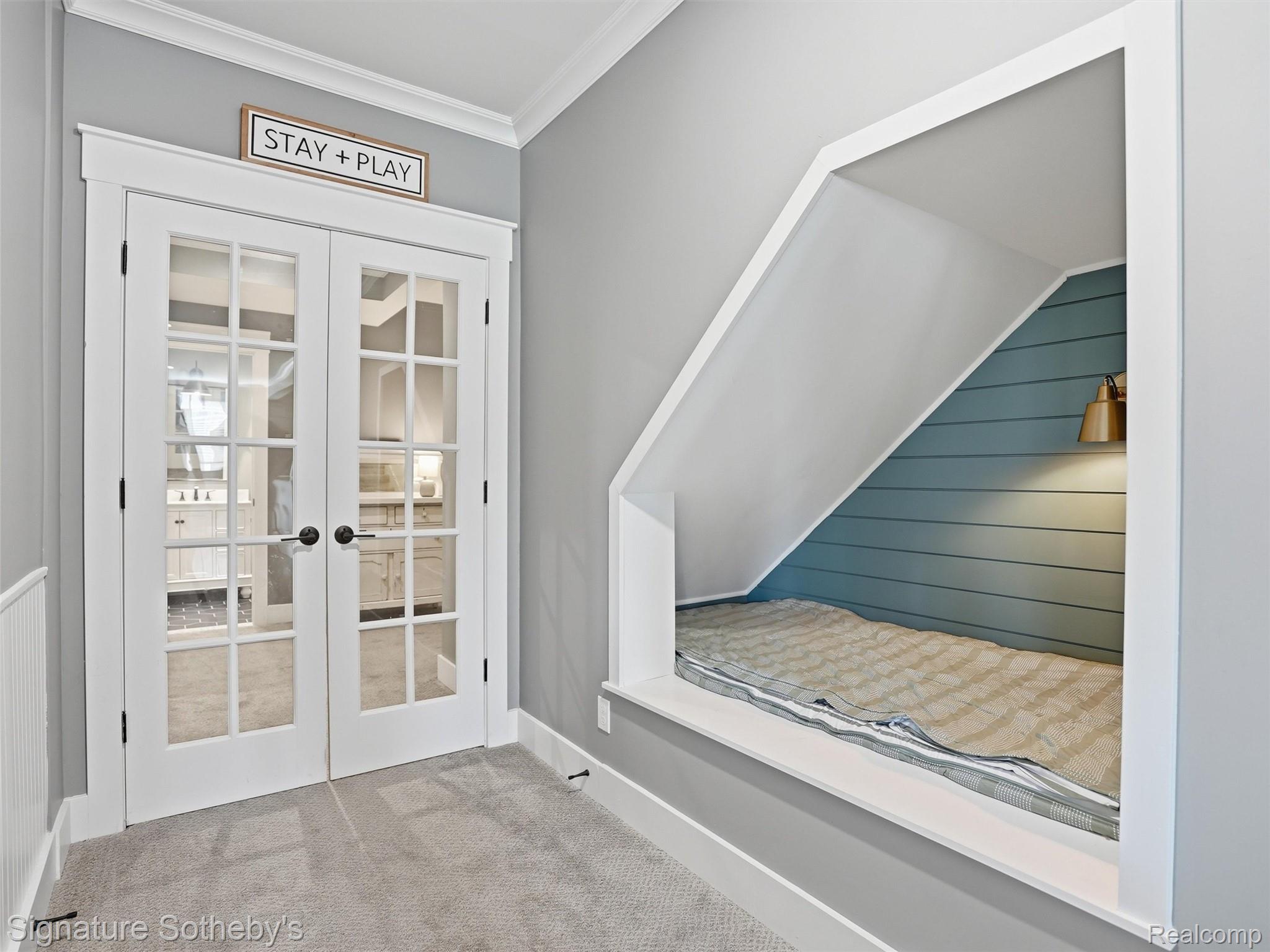 1595 Carriage Way Rochester, MI 48307 - Photo 43 of 78 Entryway with french doors, crown molding, and carpet