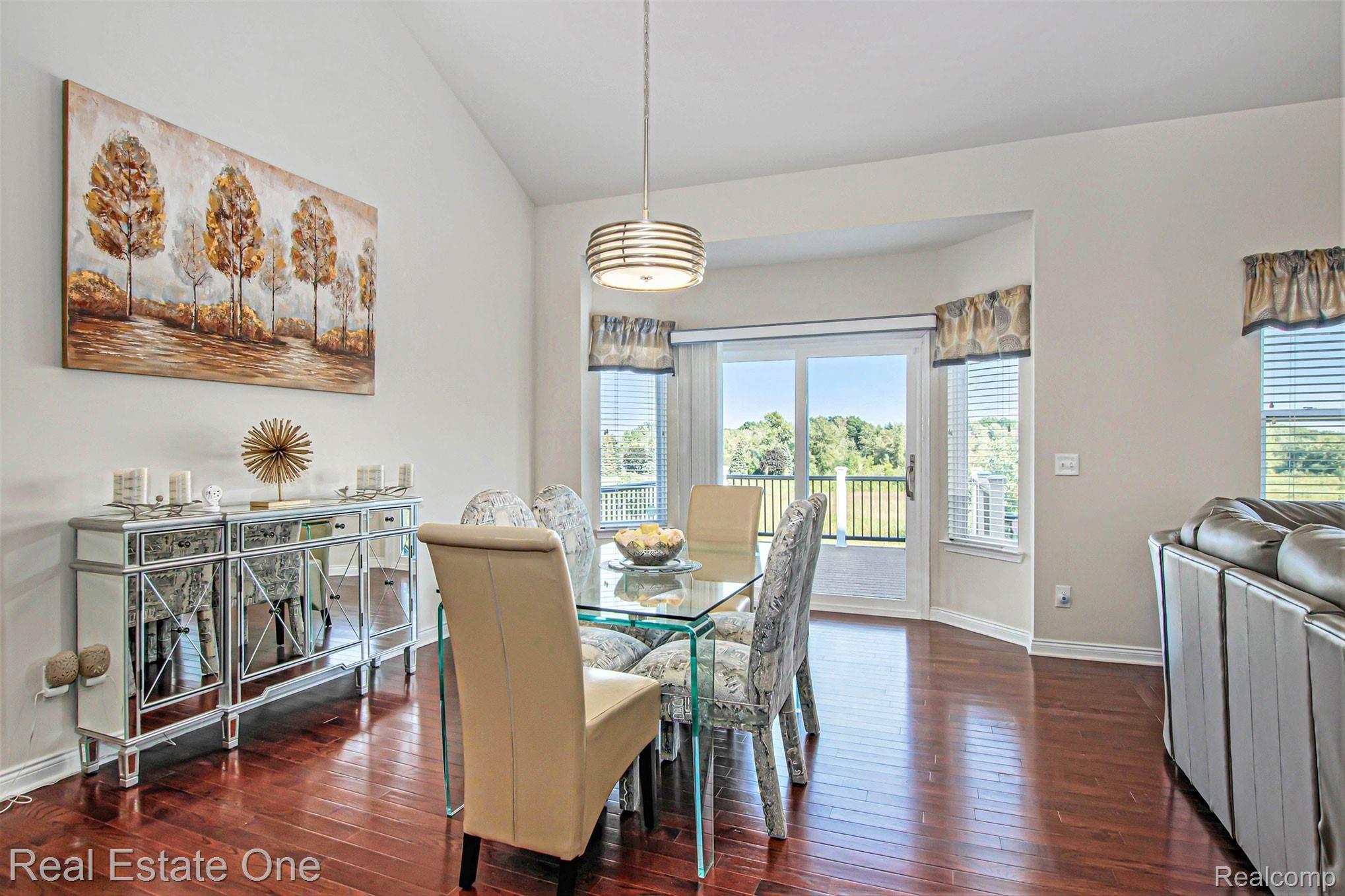 23882 Enclave Drive South Lyon, MI 48178 - Photo 10 of 29 Large dining area open to great room