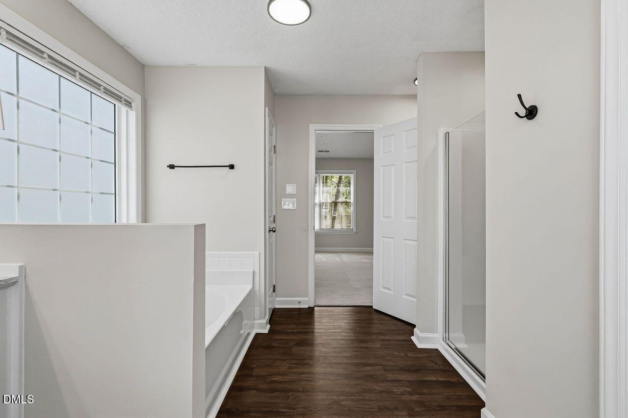 1936 Crag Burn Lane Raleigh, NC 27604 - Photo 30 of 51 g_Int_Primary Bath to Bedroom