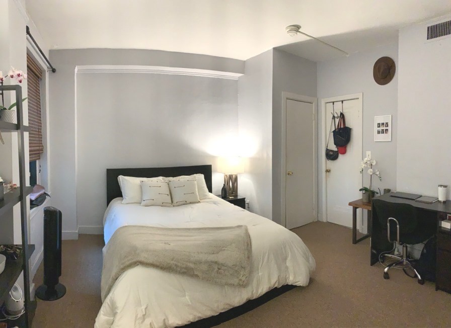 475 Commonwealth Avenue, Unit 401 Boston, MA 02215 - Photo 4 of 11 a bedroom with a bed and a desk