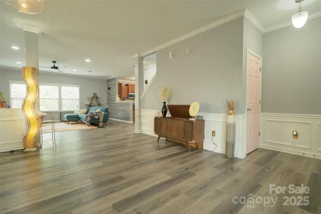 a view of kitchen and dining room with wooden floor