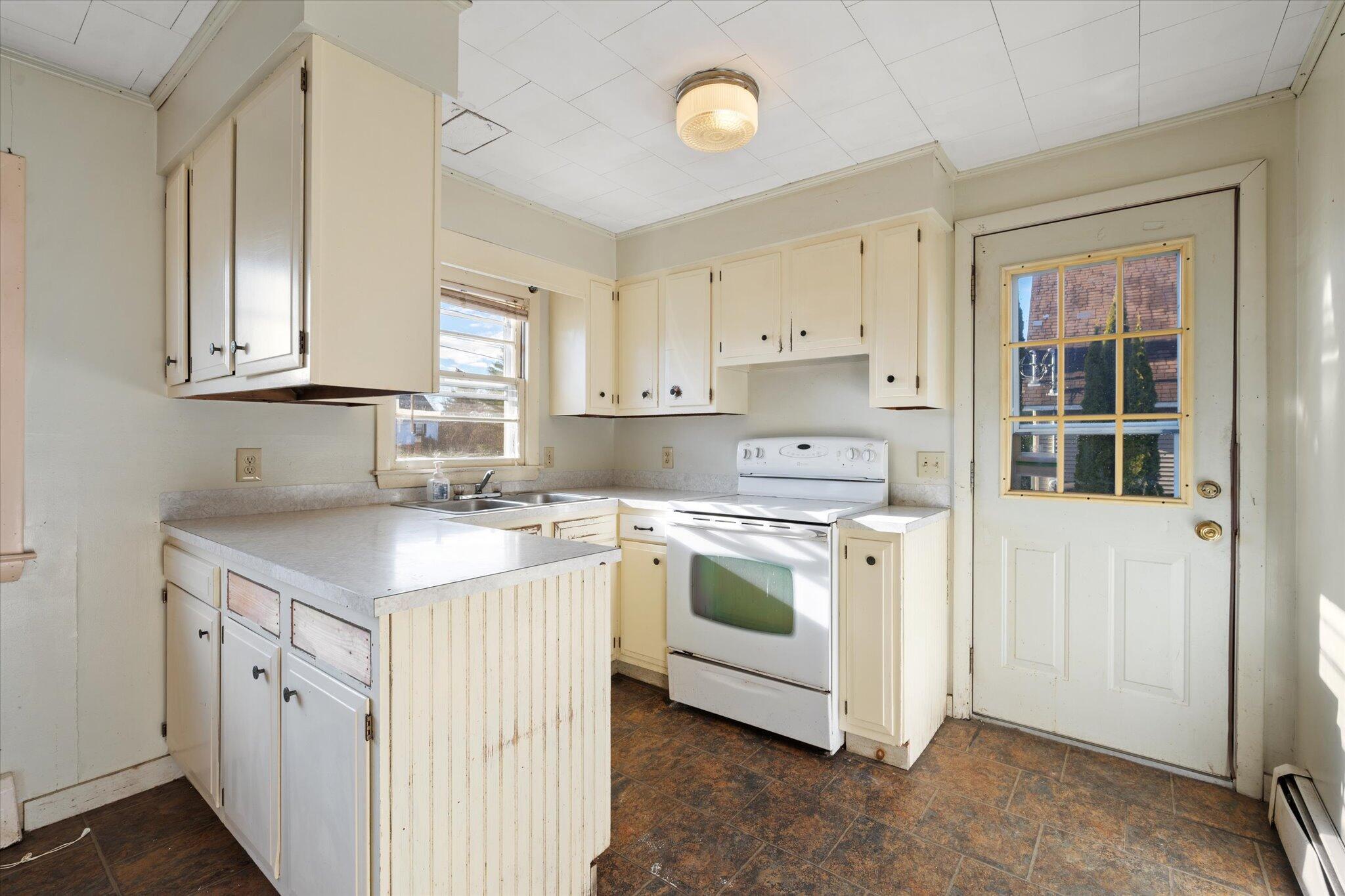 58 Washington Street Ellsworth, ME 04605 - Photo 4 of 29 04-Kitchen - Side Door