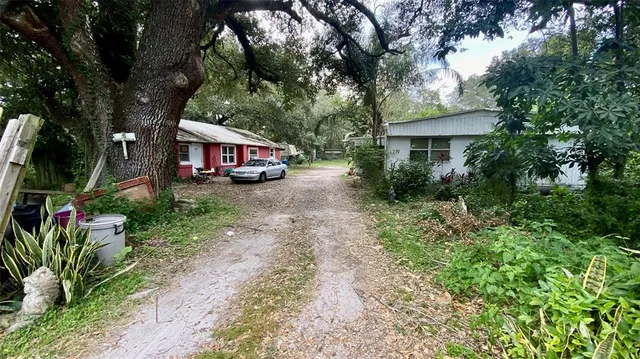 a house view with a garden space